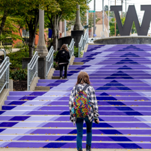 student on stairwell on UW Tacoma campus