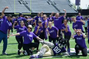 Dubs poses with UW Radiology UW Fitness Day participants.