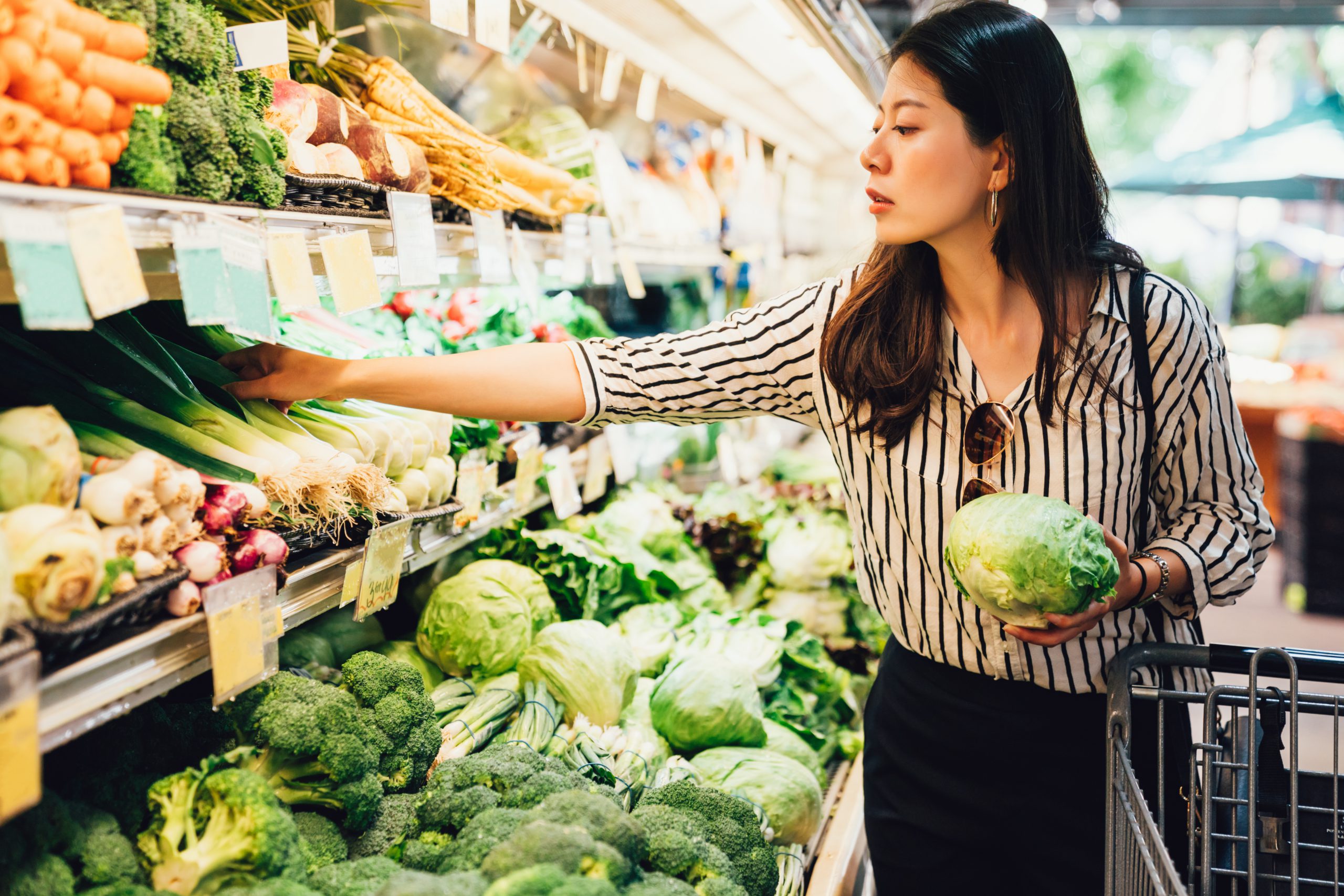 woman in produce aisle