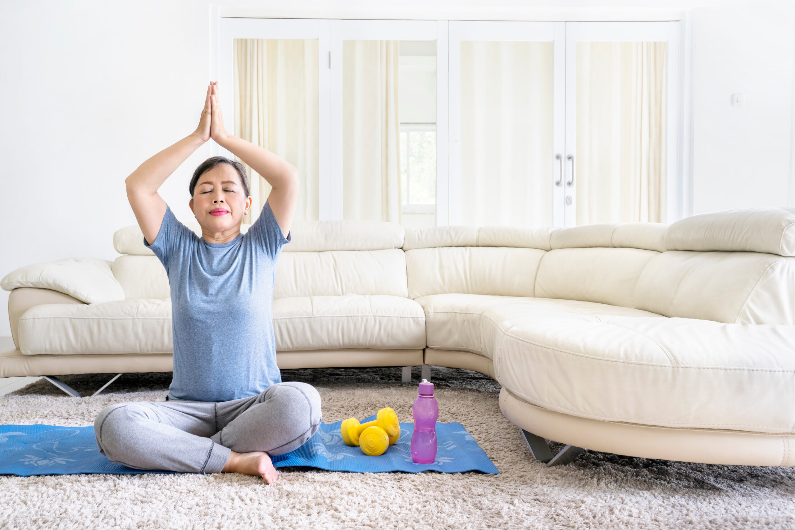 woman meditating in a yoga pose