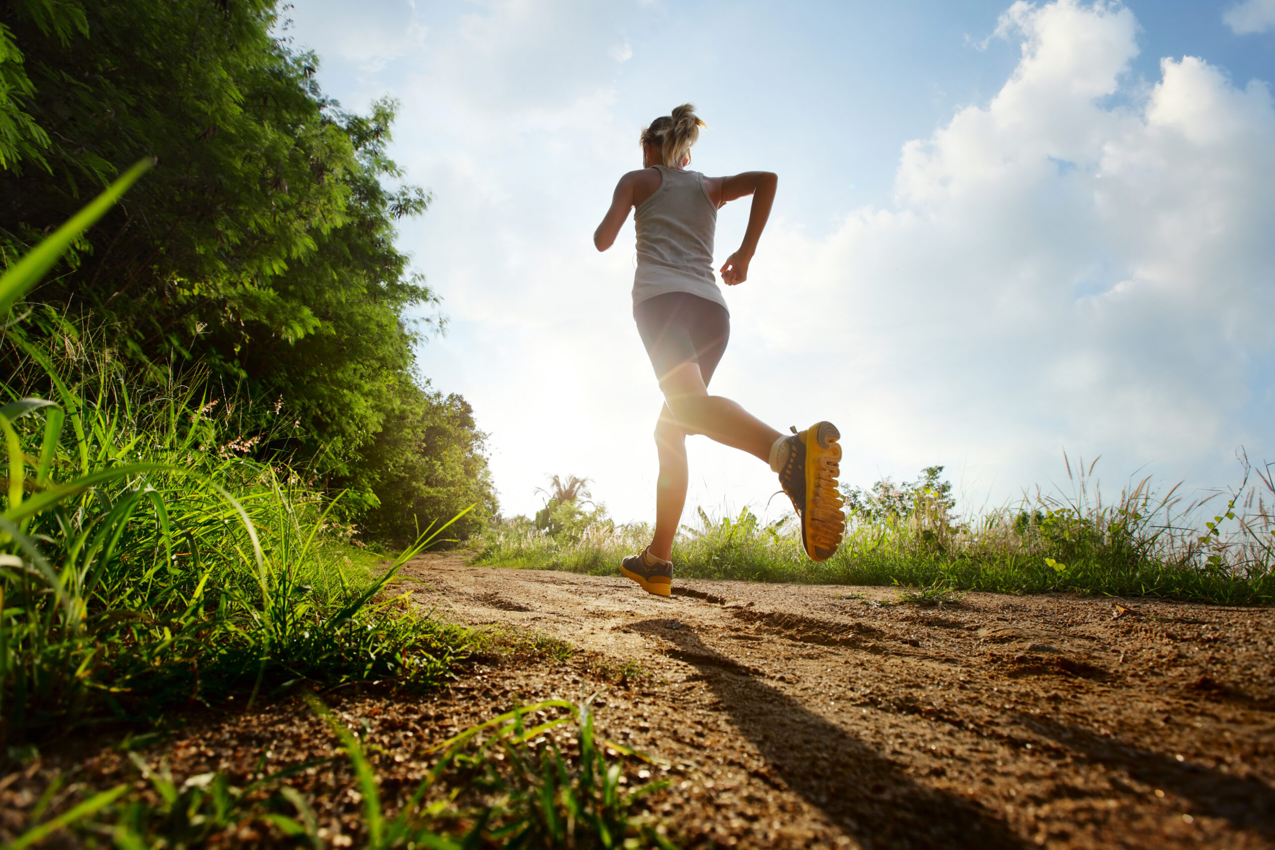 woman running on trail
